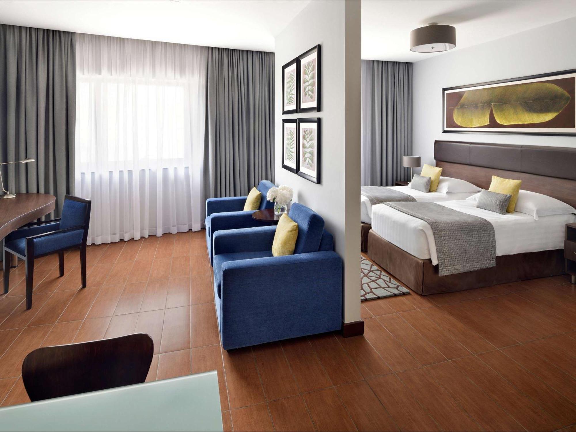 Moevenpick Hotel Apartments Al Mamzar Dubai Ngoại thất bức ảnh A room at the hotel