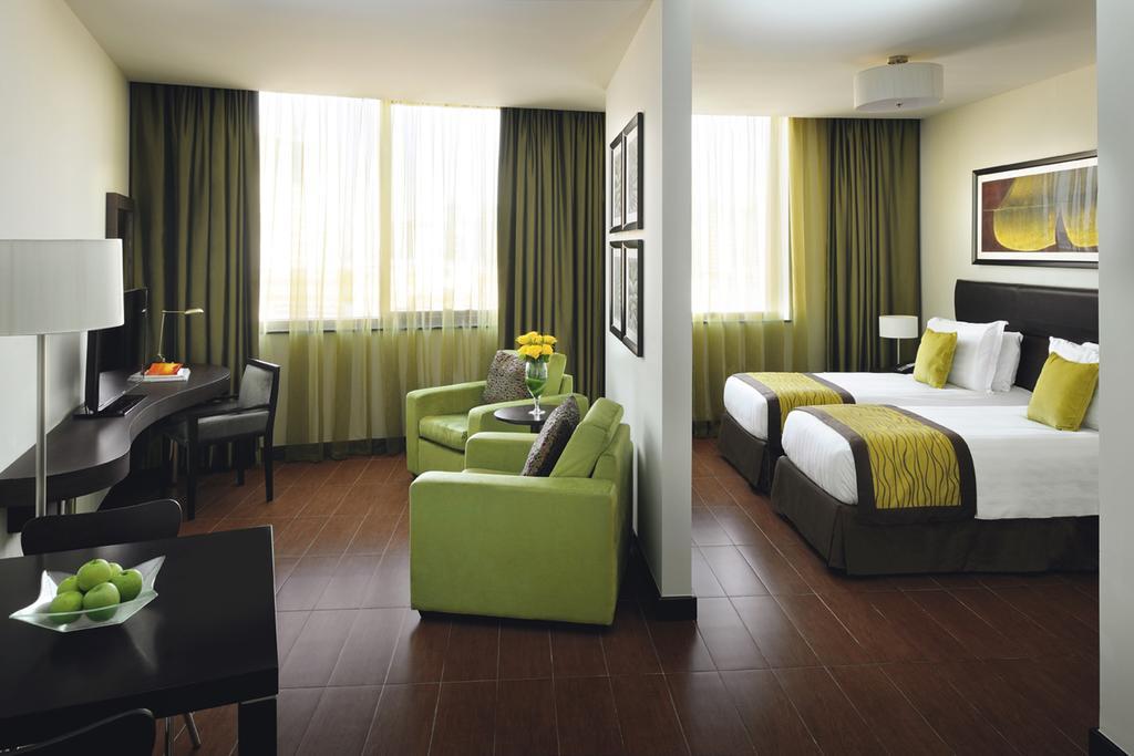 Moevenpick Hotel Apartments Al Mamzar Dubai Ngoại thất bức ảnh A typical room at the hotel